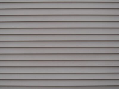 gray composite cladding on the exterior of a house