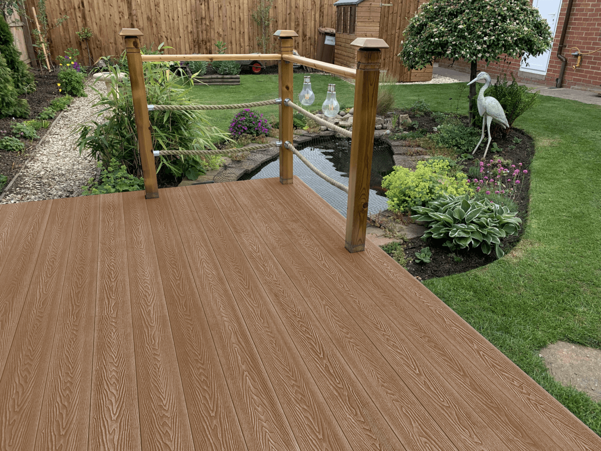 composite decking in amber with a pond background