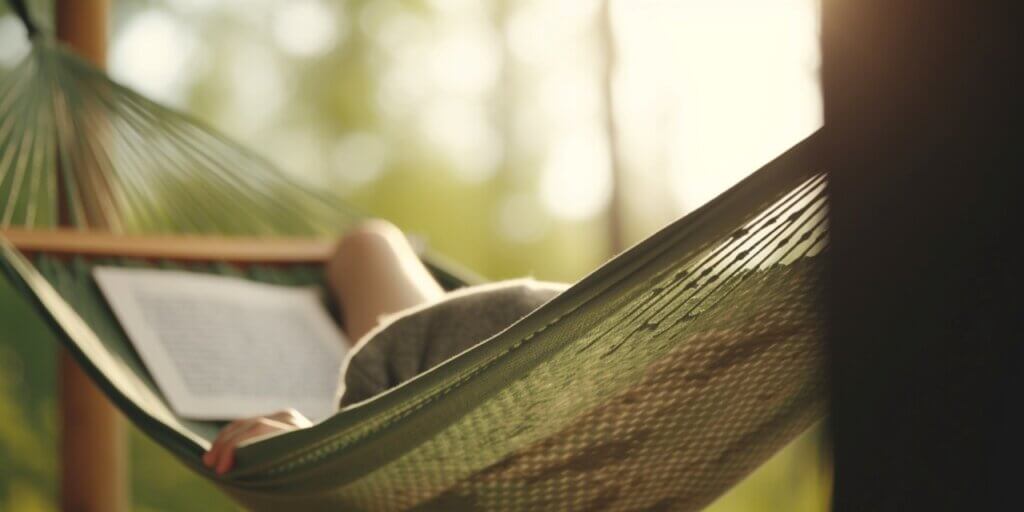 person relaxing on a hammock