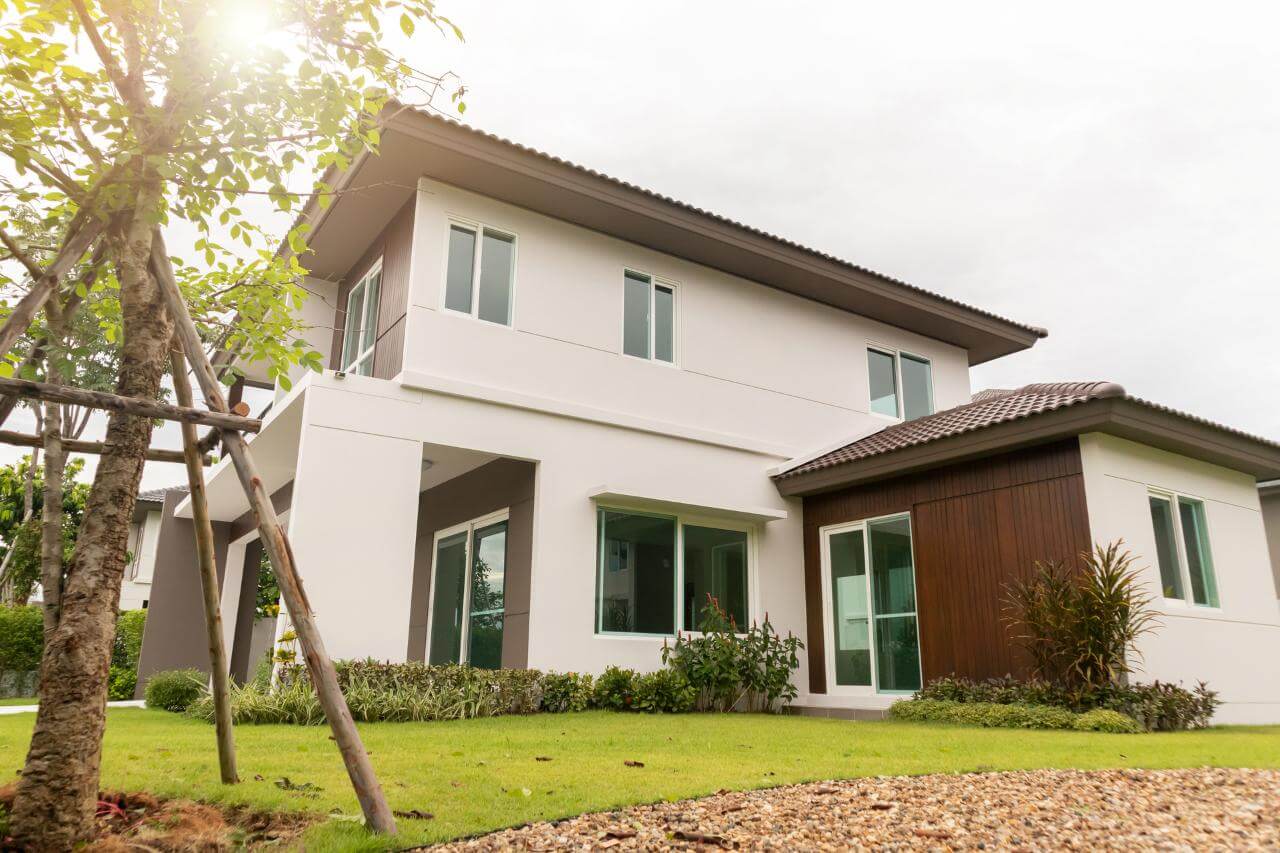 beautiful home with green grass