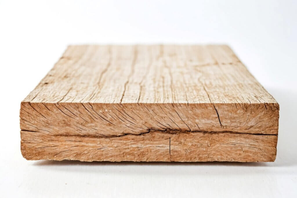 untreated wooden plank on white background