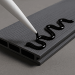 CompBond glue being applied to composite decking