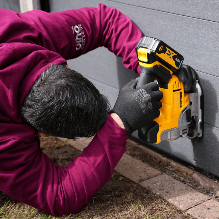 Installing a hedgehog highway using a jigsaw